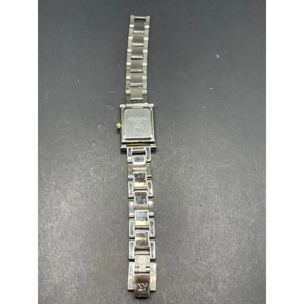 Anne Klein Women's 10/1409 Silver Dial Gold Accented Quartz Watch 21.5mm 6.5